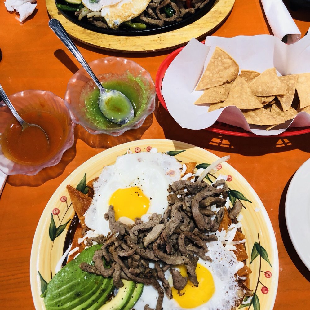 Quetzally - Chilaquiles (bottom) and fajita platter (top) - Mexican Near Me - Philadelphia, Pennsylvania Quetzally - Chilaquiles (bottom) and fajita platter (top) - Mexican Near Me - Philadelphia, Pennsylvania