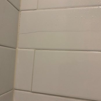 Rocklyn Homes - Cracked Tile - Real Estate Agents Near Me - Suwanee, Georgia