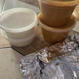a bowl of soup and a container of soup a bowl of soup and a container of soup