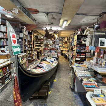 Libreria Acqua Alta - Gondola (inside) - Bookstores Near Me - Venezia, VE Libreria Acqua Alta - Gondola (inside) - Bookstores Near Me - Venezia, VE