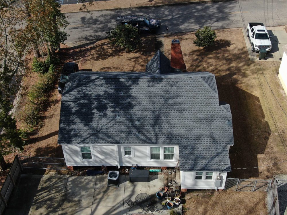 Slide of JMR Roofing