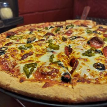 43 Ten Pizza Co - a pizza with pepperoni, olives, and cheese - Pizza Near Me - Topeka, Kansas