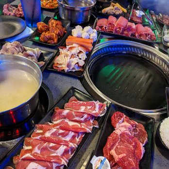 KPOT Korean BBQ & Hot Pot - Table spread - Korean Near Me - Houston, Texas KPOT Korean BBQ & Hot Pot - Table spread - Korean Near Me - Houston, Texas