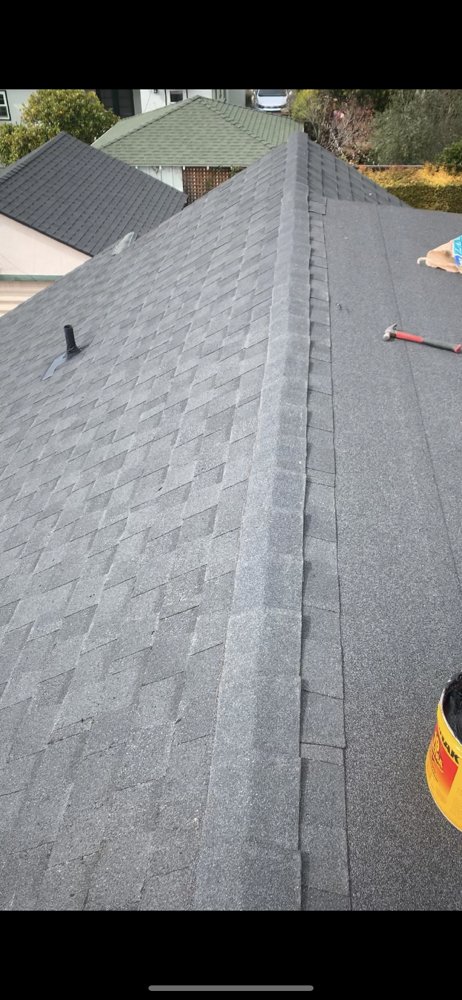 Slide of A&M Roofing and Gutters