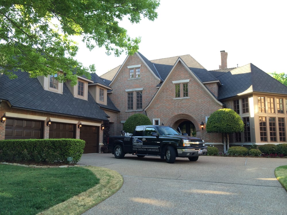 Slide of Blue Nail Roofing & Construction