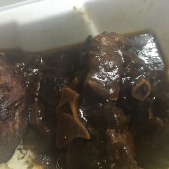 Da Reggae Cafe - Closeup of the rich, brown color of the Oxtails. - Caribbean Near Me - Greensboro, North Carolina