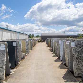 Frye Granite - a row of granite slabs - Kitchen & Bath Near Me - Tuscumbia, Alabama