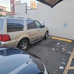 Hele - This is the overnight cashier making it so there's no room to park in the stall, its like this every single morning she works
