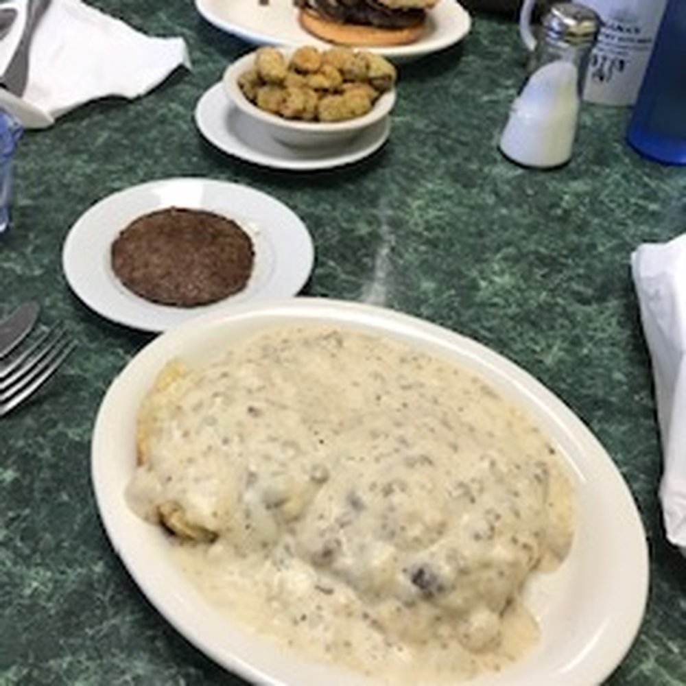 Mama's Kountry Kitchen - biscuits with sausage gravy and sausage; hamburger with a side of fried okra. - American Near Me - Seymour, Tennessee Mama's Kountry Kitchen - biscuits with sausage gravy and sausage; hamburger with a side of fried okra. - American Near Me - Seymour, Tennessee
