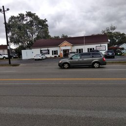 a car driving down a street a car driving down a street