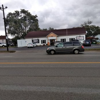 Showcase Meats - a car driving down a street - Meat Shops Near Me - Akron, Ohio Showcase Meats - a car driving down a street - Meat Shops Near Me - Akron, Ohio
