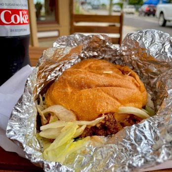 Fire Chicken Sandwiches - a bottle of coke in the background - Chicken Shop Near Me - Ashtabula, Ohio