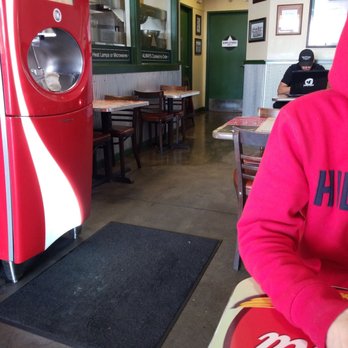Wingstop - Wet floors no sign. WTH. Just waiting for a small child or senior to slip bust something wide open. What kind of business does this. - Chicken Wings Near Me - Clovis, California