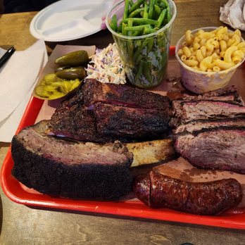 Terry Black's Barbecue - Beef ribs, pork ribs, brisket, sausage, green beans, Mac n cheese, Cole slaw, pickles, and jalapenos - Barbeque Near Me - Fort Worth, Texas