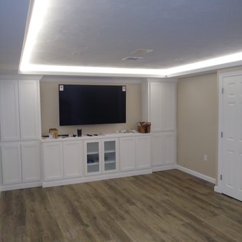 Rgh Construction - an empty room with a flat screen tv - General Contractors Near Me - Norton, Massachusetts