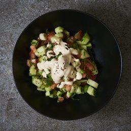 Chopped Israeli Salad Topped Tahina