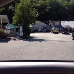 The Shed Garden Center - Power Equipment Rental in back