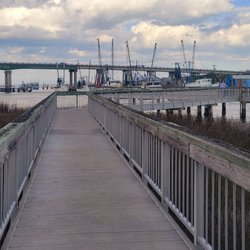Lazaretto Creek Park Fishing Pier - Fishing pier with Lazaretto Creek Bridge in the background.