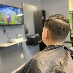 Family Cutz - Clean Haircut while he enjoys the X-box.