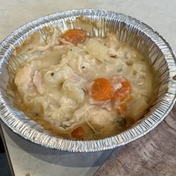 KFC - Saddest looking pot pie filling, half full and must have sat there for awhile.