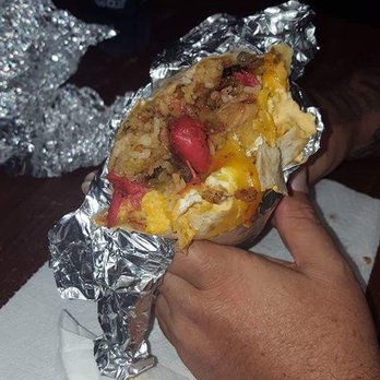 FiyahNesian Cuisine - The Big Uso Burrito which contains 3 different meats, fried rice and fried eggs, delicious!!! - Mexican Near Me