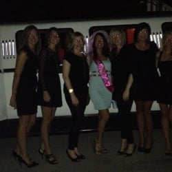 Tiger Limo - A lovely Bachelorette Party posing in front of our White Stretch Limo, having a fun night out on the town!