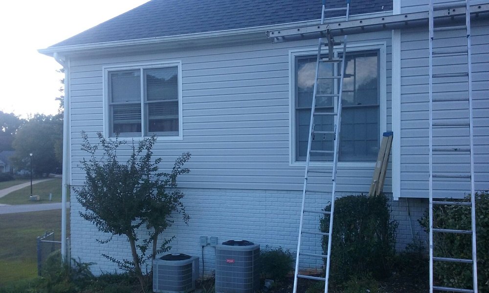 Slide of Tim's Roofing