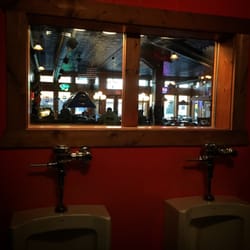 Main Street Pub & Grill - That's right. Because you know you'll be more relaxed in the men's room when you can keep your eye in the dining area!