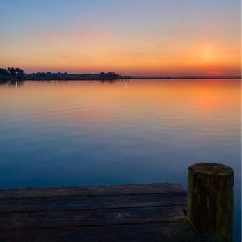 Sun Outdoors Frontier Town - The gorgeous sunrise from the pier. - Campgrounds Near Me - Berlin, Maryland