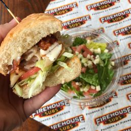 Firehouse Subs - a hand holding a sandwich - food, sandwiches - Sandwiches Near Me - Murfreesboro, Tennessee