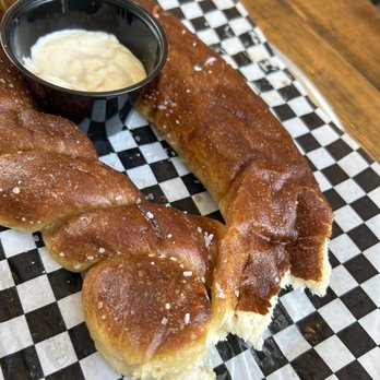 Commonhouse Aleworks - Pretzel with beer cheese (yes we've already taken a bit or two or ten!) - Breweries Near Me - North Charleston, South Carolina Commonhouse Aleworks - Pretzel with beer cheese (yes we've already taken a bit or two or ten!) - Breweries Near Me - North Charleston, South Carolina