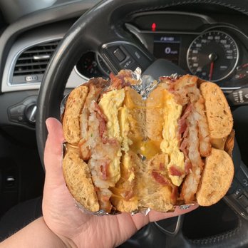 Burgh’s Bagels - Bacon, cheddar, scrambled egg, and hash brown on red pepper peno bagel. The red pepper peno bagel is some so unique and delicious - Bagels Near Me - Pittsburgh, Pennsylvania Burgh’s Bagels - Bacon, cheddar, scrambled egg, and hash brown on red pepper peno bagel. The red pepper peno bagel is some so unique and delicious - Bagels Near Me - Pittsburgh, Pennsylvania