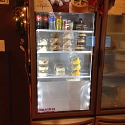 Tere Cazola - Cake slices behind the counter