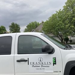 Franklin Outdoor Services - Company truck parked on street by our apartment complex.