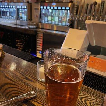 Red White & Brew - My beer and the view of the wine and beer taps. - Wine Bars Near Me - Rochester, New York Red White & Brew - My beer and the view of the wine and beer taps. - Wine Bars Near Me - Rochester, New York