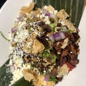 Xoco - Fully dressed guac: spicy roasted poblano, chicharrón, grilled onion, smoky bacon, local MightyVine tomato, queso fresco, pumpkin seeds - Mexican Near Me - Chicago, Illinois Xoco - Fully dressed guac: spicy roasted poblano, chicharrón, grilled onion, smoky bacon, local MightyVine tomato, queso fresco, pumpkin seeds - Mexican Near Me - Chicago, Illinois