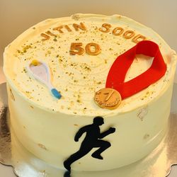 Cakes N Party - Ras Malia cake with custom fondant decor