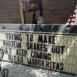 Tacos Al Corazon - Hilarious sign they were putting up