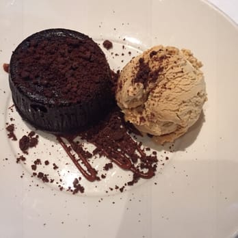 Herbsaint - Chocolate pudding cake and peanut brittle ice cream - I wish I would have taken a picture of the luscious caramel center - French Near Me - New Orleans, Louisiana Herbsaint - Chocolate pudding cake and peanut brittle ice cream - I wish I would have taken a picture of the luscious caramel center - French Near Me - New Orleans, Louisiana