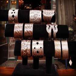 Little Shoppes On High - Fair Trade and recycled jewelry like these bracelets made in Haiti from recycled oil cans.