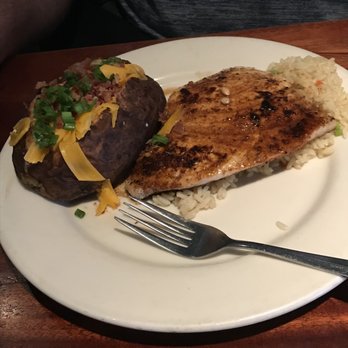 Charleston's - Swordfish with rice and baked potato - American Near Me - Mesa, Arizona Charleston's - Swordfish with rice and baked potato - American Near Me - Mesa, Arizona