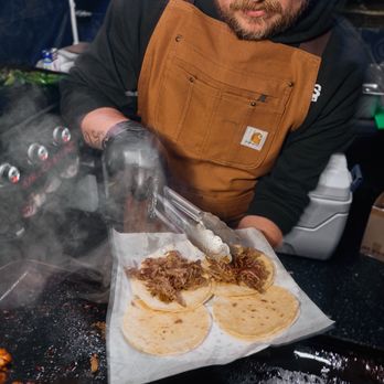 Taqueria Gueros - a man preparing food - Tacos Near Me Taqueria Gueros - a man preparing food - Tacos Near Me