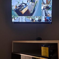 Wired for Life - Custom CCTV system monitor install with concealed power extension and HDMI drop.