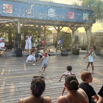 Seawitch - Live music with a stage, area for dancing, and seating surrounding it - Venues & Event Spaces Near Me - Carolina Beach, North Carolina Seawitch - Live music with a stage, area for dancing, and seating surrounding it - Venues & Event Spaces Near Me - Carolina Beach, North Carolina