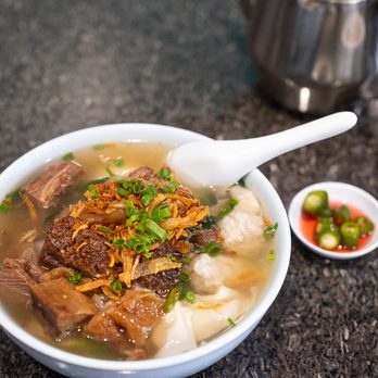 Lollibowl - Beef stew over egg noodles and added wontons - Chinese Near Me - Sacramento, California Lollibowl - Beef stew over egg noodles and added wontons - Chinese Near Me - Sacramento, California