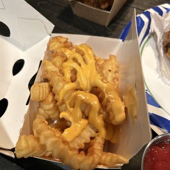 Shake Shack 6201 Hollywood - Hollywood & Gower - A drizzle of cheese, for an extra $2 - Burgers Near Me - Los Angeles, California Shake Shack 6201 Hollywood - Hollywood & Gower - A drizzle of cheese, for an extra $2 - Burgers Near Me - Los Angeles, California