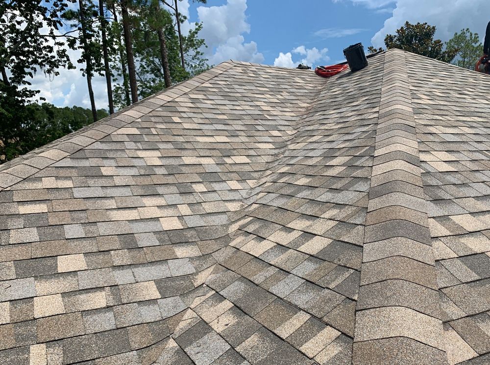 Slide of AK Certified Roofing