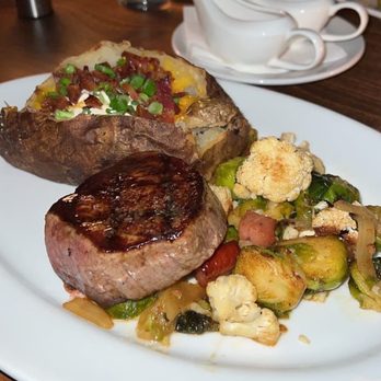 Prime Table - Filet, loaded baked potato and Brussel sprouts - Steakhouses Near Me - Stockton, California