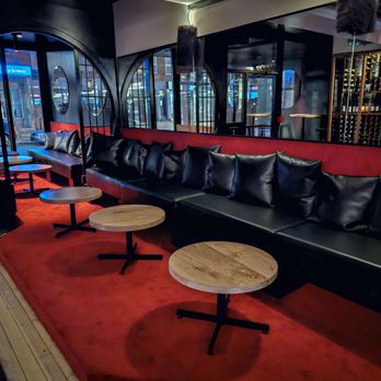 Emil Bar - black leather seating and red carpet - Bars Near Me - Montreal, Quebec Emil Bar - black leather seating and red carpet - Bars Near Me - Montreal, Quebec