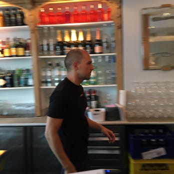 Lateral - This was the BAD Bartender!  Kept ignoring us after eye contact. Couldn't care less. - Tapas Bars Near Me - Madrid, M